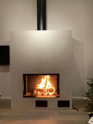 Réalisation d'une cheminée M design 1150 V luna diamond à bois-bûche à Deauville