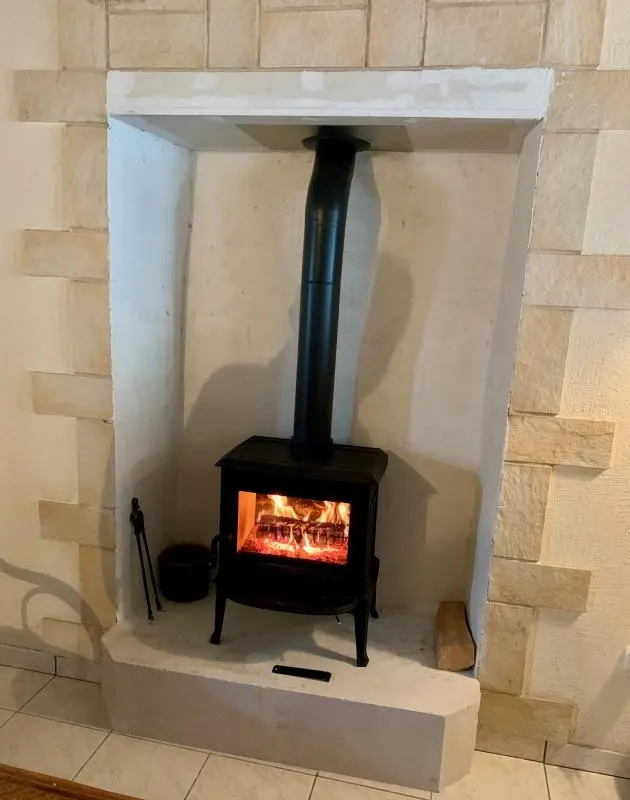 Réalisation à Langrune sur mer d'un poêle à bois Jotul F100