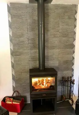 Installation d'un poêle à bois-bûche Jotul F520 à Bernières/mer