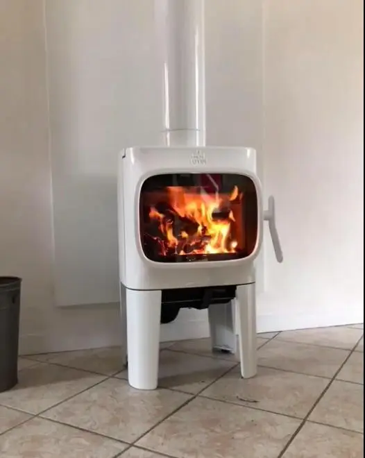 Installation d'un poêle Jotul F105 blanc à Courseulles sur Mer